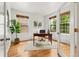 Cozy home office with hardwood floors, natural light, and stylish decor accents at 8073 S Albion St, Centennial, CO 80122