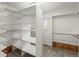 Large walk-in closet provides lots of storage space with built in shelving at 8073 S Albion St, Centennial, CO 80122