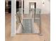 Unique basement entrance featuring glass railings and hardwood flooring at 3975 S Cherry St, Cherry Hills Village, CO 80113
