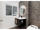 Modern bathroom featuring a vanity with illuminated mirror, stylish fixtures, and a modern toilet at 3975 S Cherry St, Cherry Hills Village, CO 80113