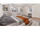 Comfortable bedroom featuring neutral colors, hardwood flooring, and natural light at 3975 S Cherry St, Cherry Hills Village, CO 80113