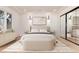 Comfortable bedroom with neutral tones, recessed lights and a decorative rug at 3975 S Cherry St, Cherry Hills Village, CO 80113