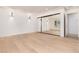 Bright and spacious bedroom with recessed lights, hardwood floors, and a mirrored closet at 3975 S Cherry St, Cherry Hills Village, CO 80113