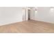 Large bright bedroom with hardwood floors and easy access to ensuite bathroom at 3975 S Cherry St, Cherry Hills Village, CO 80113