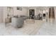Bright and airy living room with modern furnishings and elegant marble flooring at 3975 S Cherry St, Cherry Hills Village, CO 80113