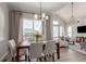 Combined living space features the dining room and Gathering room, bright and open at 16762 Tejon Ln, Broomfield, CO 80023