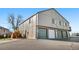 Multi-unit exterior showcasing multiple garage doors at 7700 W Glasgow Pl # 10A, Littleton, CO 80128