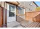 Inviting front porch with wood deck and well-maintained exterior, perfect for enjoying the outdoors at 7700 W Glasgow Pl # 10A, Littleton, CO 80128
