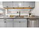 This kitchen has granite countertops, modern cabinetry, and stainless steel appliances at 7700 W Glasgow Pl # 10A, Littleton, CO 80128