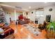 Basement with a laminate floor and comfortable seating at 8624 S Doubleheader Ranch Rd, Morrison, CO 80465