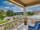 Picturesque front porch with scenic neighborhood views and comfortable seating, perfect for relaxing outdoors at 784 Sweet Pine Ct, Monument, CO 80132