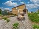 Two story home featuring rock landscaping in front yard at 784 Sweet Pine Ct, Monument, CO 80132