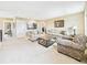 Cozy living room with neutral color scheme and comfortable seating arrangement, perfect for relaxation and entertaining guests at 784 Sweet Pine Ct, Monument, CO 80132