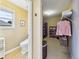 Walk-in closet featuring shelving, storage, and a toilet at 784 Sweet Pine Ct, Monument, CO 80132