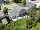 The house as seen from above, highlighting its inviting backyard, patio area, and verdant landscaping at 20789 E Princeton Pl, Aurora, CO 80013