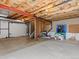 Unfinished basement featuring concrete floors, bright lighting, and white walls at 20789 E Princeton Pl, Aurora, CO 80013