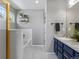 Beautiful bathroom with tiled tub, shower and sleek vanity creating a clean design at 20789 E Princeton Pl, Aurora, CO 80013