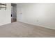 Spacious bedroom with neutral tones, plush carpeting, and open doorway to the ensuite at 20789 E Princeton Pl, Aurora, CO 80013