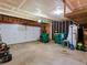 Garage interior featuring a spacious layout, and a large white door at 20789 E Princeton Pl, Aurora, CO 80013