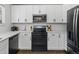 Kitchen area featuring black stainless steel appliances and white countertops at 20789 E Princeton Pl, Aurora, CO 80013