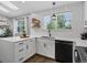 Kitchen featuring white countertops, white cabinets and stainless steel appliances at 20789 E Princeton Pl, Aurora, CO 80013