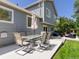 Outdoor patio area features comfortable seating and a table for dining at 20789 E Princeton Pl, Aurora, CO 80013