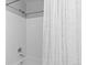 Full shower featuring white tiles and stylish shower curtains at 20789 E Princeton Pl, Aurora, CO 80013