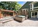 Outdoor oasis with hot tub, deck, and pergola, perfect for entertaining guests at 10957 Bryant St, Westminster, CO 80234