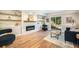 Relaxing finished basement with a fireplace, modern flooring and access to the outdoor backyard at 10957 Bryant St, Westminster, CO 80234