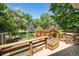 Spacious deck with pergola and outdoor seating overlooking a sprawling landscaped yard at 10957 Bryant St, Westminster, CO 80234