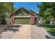 Charming single-Gathering home with a brick facade and a well-manicured lawn on a sunny day at 10957 Bryant St, Westminster, CO 80234