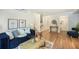 Stylish living room area with hardwood floors, comfortable seating, and modern decor at 10957 Bryant St, Westminster, CO 80234