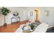 Spacious bedroom with hardwood floors, decor, and a bright, airy atmosphere at 10957 Bryant St, Westminster, CO 80234