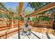 Charming pergola with a table and built in seating overlooking a green lawn at 10957 Bryant St, Westminster, CO 80234