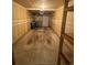 Attached single-car garage with extra shelving at 12652 E Warren Dr # C, Aurora, CO 80014