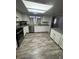 Kitchen with granite countertops and white cabinets at 12652 E Warren Dr # C, Aurora, CO 80014