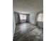 Living room featuring gray wood-look flooring and neutral walls at 12652 E Warren Dr # C, Aurora, CO 80014
