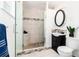 Modern bathroom with glass shower, updated vanity, and contemporary fixtures at 4197 S Grant St, Englewood, CO 80113