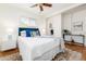 Bedroom featuring natural light, ceiling fan, and stylish decor at 4197 S Grant St, Englewood, CO 80113