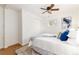 Bedroom featuring natural light, a ceiling fan, and ample storage at 4197 S Grant St, Englewood, CO 80113