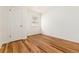 Empty bedroom with hardwood floors and natural light at 4197 S Grant St, Englewood, CO 80113