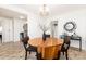 Cozy dining room with a round table and easy access to kitchen at 4197 S Grant St, Englewood, CO 80113