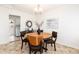Inviting dining room with wood table, stylish decor, and ample natural light at 4197 S Grant St, Englewood, CO 80113
