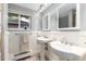 Bathroom with double sinks and ample light at 2934 S Columbine St, Denver, CO 80210