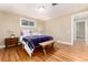 Bedroom featuring hardwood floors, and a window at 2934 S Columbine St, Denver, CO 80210