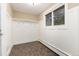 Mud room featuring built in shelving, hooks and tile flooring at 2934 S Columbine St, Denver, CO 80210