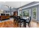 Elegant dining room features a dining table, hardwood floors, and sliding doors with a backyard view at 1480 Sterling Hill Ct, Castle Rock, CO 80104