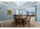 Charming dining room with chandelier and classic decor, showcasing an open-concept floor plan at 1480 Sterling Hill Ct, Castle Rock, CO 80104