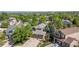 Aerial shot of a home with mature landscaping, lush trees, and a basketball hoop at 2043 Fendlebrush St, Highlands Ranch, CO 80129