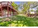 A huge backyard with an open lawn with easy access to the deck from the upper level at 2043 Fendlebrush St, Highlands Ranch, CO 80129